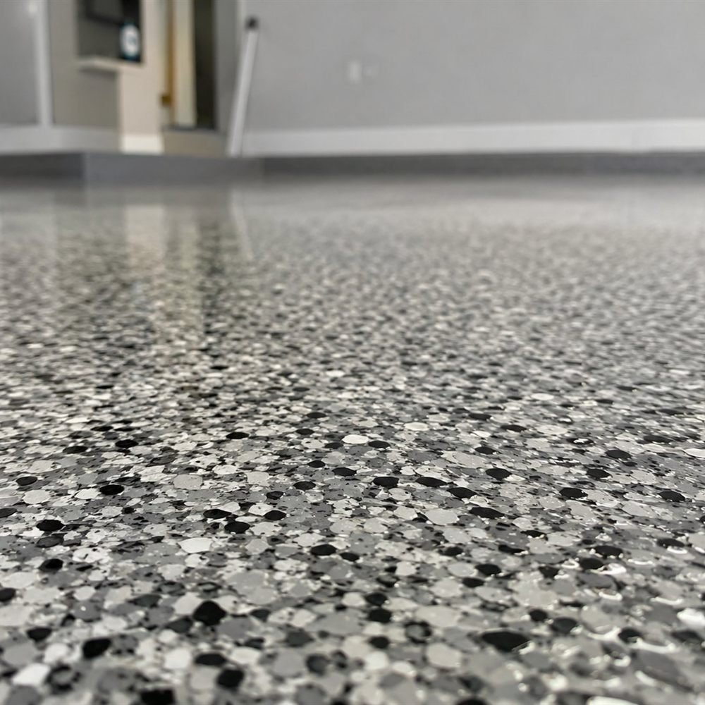 Plancher époxy Garage résidentiel à Sainte-Anne-des-Plaines